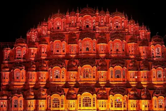 Hawa Mahal illuminated at night during a Jaipur city tour