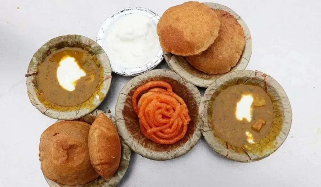 Street food served on leaf plates at a local stall in Agra