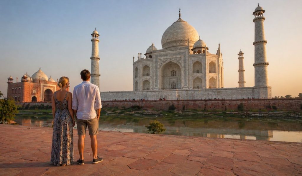 Tourists admiring Taj Mahal in soft morning light with peaceful surroundings
