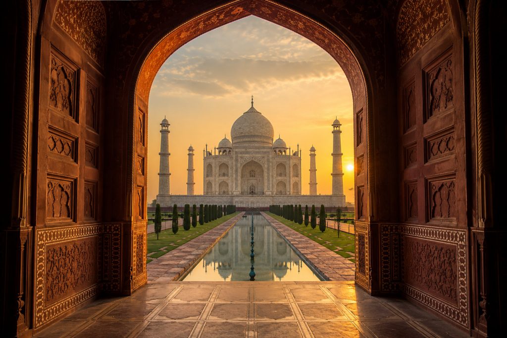 Best photography spot at the Taj Mahal with reflecting pool at sunrise