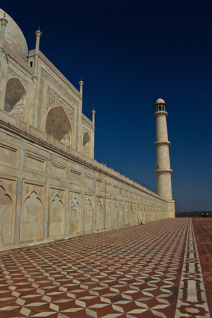 Detail of the eastern wall and towering minaret of the Taj Mahal